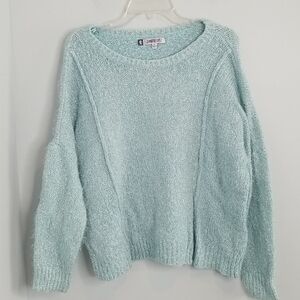 Jennifer Lopez blue metallic fuzzy sweater